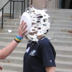 Dr. Davis is getting a whipped cream pie to the face for Pi Day