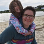 Dr. Davis and her daughter at a beach in Cape Cod.